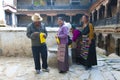 Tibetan pilgrims make offerings Royalty Free Stock Photo