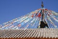 Tibetan prayer flags & Building