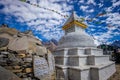 Prayer flags on big stupa with buddha eyes in Nepal on the way to Ama Dablam mountain Royalty Free Stock Photo