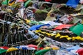 Tibetan prayer flags waving and swaddled with trees an mountain in sideway over frozen river with mountain in background at Thangu Royalty Free Stock Photo