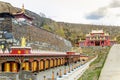 Tibetan Prayer Wheels and monastery Royalty Free Stock Photo