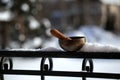 Tibetan singing bowl with its hammer on balustrade, close-up. - winer Image