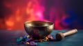 Tibetan singing bowl with tumbled healing stones on colorful gradient background Royalty Free Stock Photo