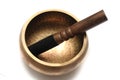 A Tibetan singing bowl with a wooden striker Royalty Free Stock Photo