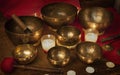 Tibetan singing bowls with candles Royalty Free Stock Photo