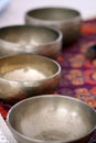 Tibetan singing bowls close up for a sound healing therapy session. Royalty Free Stock Photo