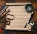 Tibetan singing copper bowl with a wooden clapper , objects for meditation and alternative medicine, top view. Plunging into a Royalty Free Stock Photo