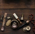 Tibetan singing copper bowl with a wooden clapper , objects for meditation and alternative medicine, top view Royalty Free Stock Photo