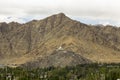 A Tibetan stupa on the mountain above the city