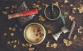 Tibetan themed flat lay with examples of two different singing bowls - a dark brown, and gold colored one