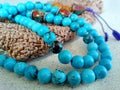 Tibetan turquoise rosary with brown handmade knitted cover