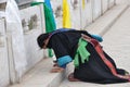 Tibetan woman praying