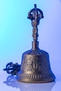 Tibeten bell and Dorje on a blue/purple background Royalty Free Stock Photo