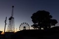 Tibidabo amusement park in silhouette at sunrise