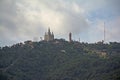 Tibidabo hill , with Sagrat Cor church and amusement park. Barcelona, Spain