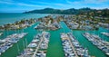 Tiburon Yacht Club boats aerial overlooking waterfront houses in Paradise Cay Yacht Harbor
