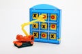 Tic Tac Toe and Toy Earthmover Royalty Free Stock Photo