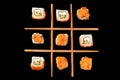 Tic-tac-toe game made from sushi, top view