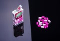 Tic tacs isolated on dark background. Royalty Free Stock Photo
