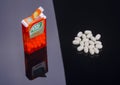 Tic tacs isolated on dark background. Royalty Free Stock Photo