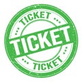 TICKET text written on green round stamp sign