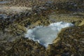 Tidal Pool in the Lava Rock in Aruba Royalty Free Stock Photo