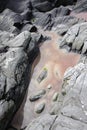 Tidal pool between rocks Royalty Free Stock Photo