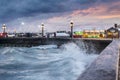 Tidal waves along Rizal Boulevard at dusk, Dumaguete waterfront,Negros Island,Philippines