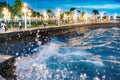 Tidal waves along Rizal Boulevard at dusk, Dumaguete waterfront,Negros Island,Philippines