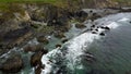 Tidal waves of the Atlantic Ocean near coast of the island of Ireland. Rocky seashore. Seascape, top view