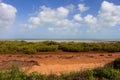 The tide ebbs out leaving the mangroves exposed near Mangrove Point , Broome, Western Australia.