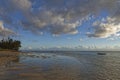 The Tide going out on the edge of Le Morne Beach, with small pools of water forming in the sand. Royalty Free Stock Photo