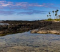 Tide Pool On The Volcanic Shoreline of Keiki Beach Royalty Free Stock Photo