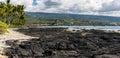 Tide Pool On The Volcanic Shoreline of Keiki Beach Royalty Free Stock Photo