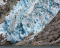 Tidewater Glacier between rock outcroppings