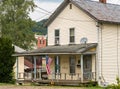 Tidioute, Pennsylvania, USA August 5, 2023 The front of an old wooden house on Buckingham Street