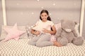 Tidy bedroom. Cute cozy bedroom for small girl. Girl having fun bedroom interior. Childhood concept. Bedroom place relax