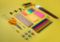 Tidy School Stationary on Yellow Background