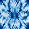 Tie dye design. Seamless repeating pattern. Dyed indigo fabric background and textured. Pattern of blue dye on cotton cloth, Royalty Free Stock Photo