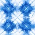 Tie dye design. Seamless repeating pattern. Dyed indigo fabric background and textured. Pattern of blue dye on cotton cloth, Royalty Free Stock Photo