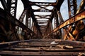 Tied-Arch Bridge. old rusty aged railroad bridge over a river. blue sky with white clouds.