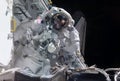 Tied astronaut in outer space on a space station. Elements of this image were furnished by NASA Royalty Free Stock Photo