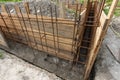 Tied rebar and mounted formwork close-up before pouring the strip foundation when building a house