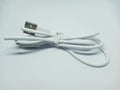 Tied White USB Cable on White Background Royalty Free Stock Photo