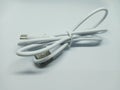 Tied White USB Cable on White Background Royalty Free Stock Photo