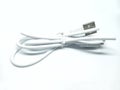 Tied White USB Cable on A White Background Royalty Free Stock Photo