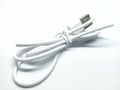 Tied White USB Cable on A White Background Royalty Free Stock Photo