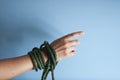 Tied Women Hands Freedom Concept isolated Blue Background