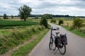 Tiel, Gelderland, The Netherlands, Trekking bike standing on a cyclist road surrounded by nature