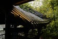 Tile-roofed gallery in bamboo on sunny day